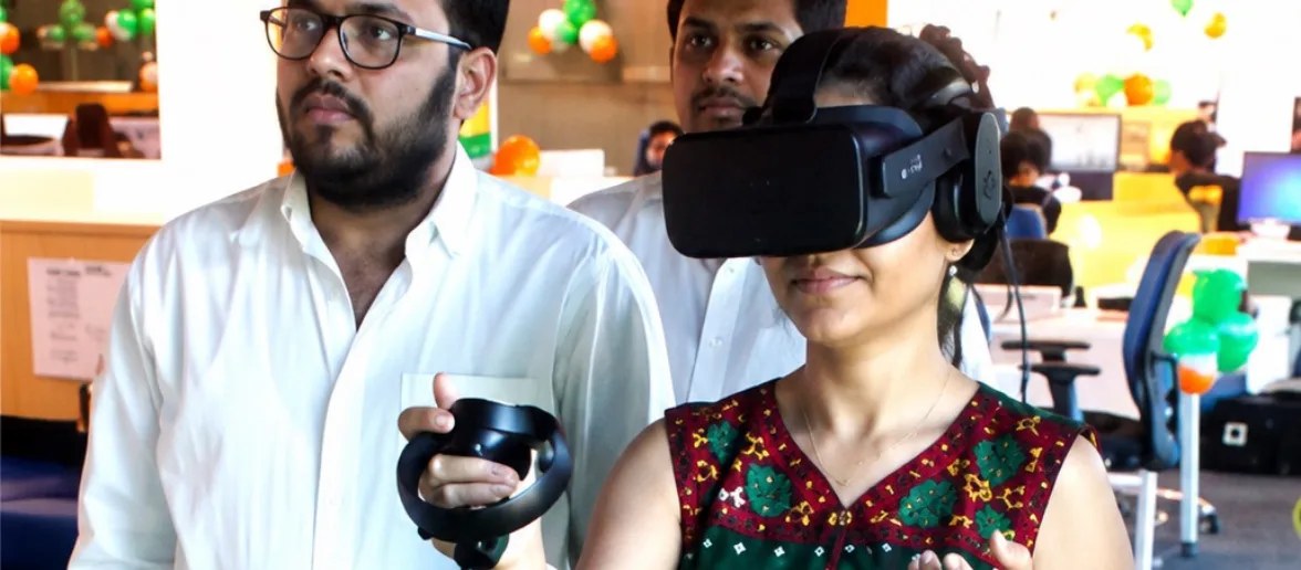 Image of People enjoying VR Games Team Building Activities in Office